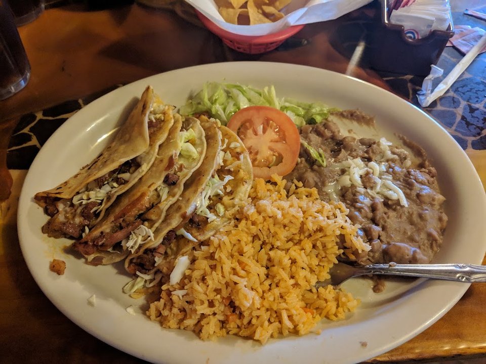 1 Enchilada C Arroz Y Frijoles